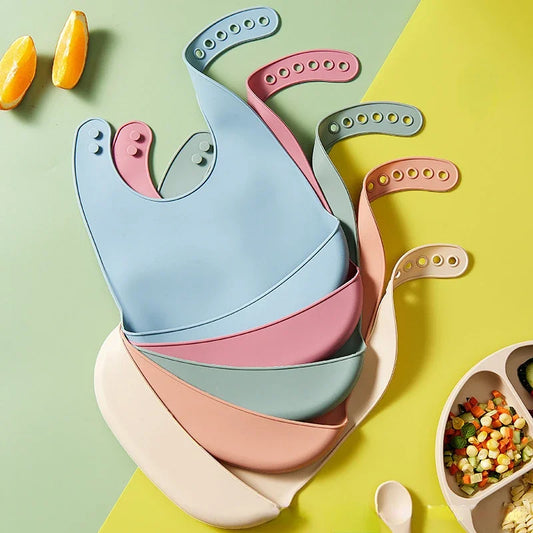 Snacky – Silikonlätzchen mit Auffangtasche